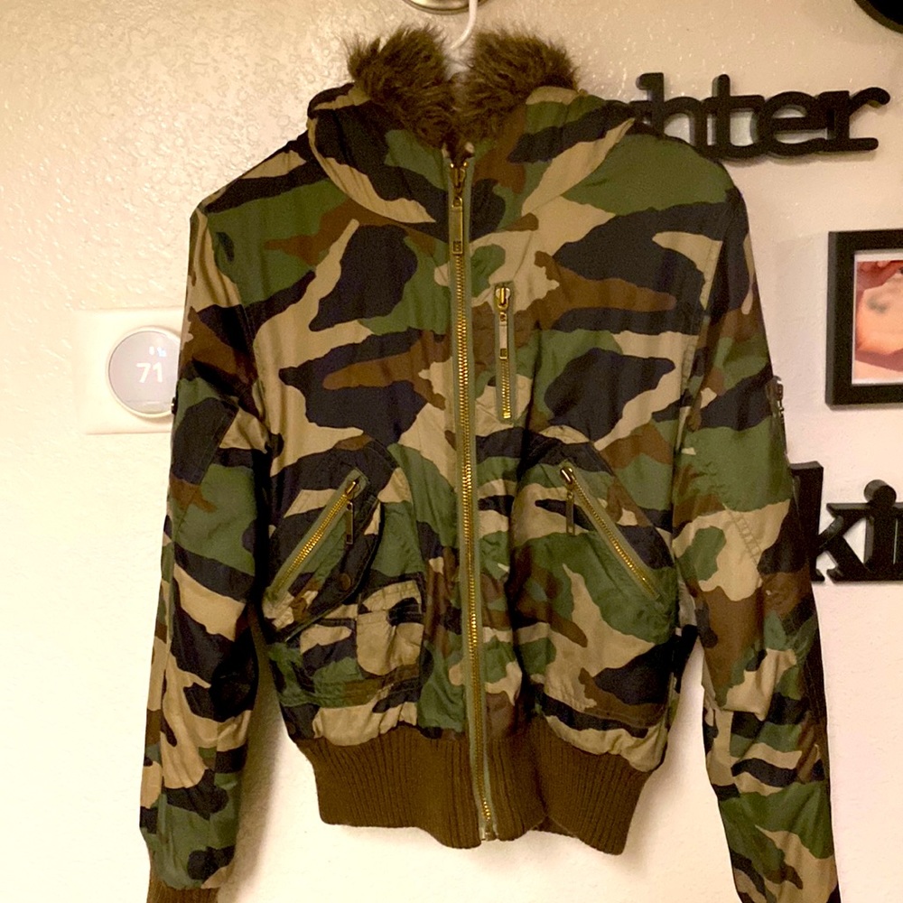 Bomber Jacket with hood, many zipper pockets, camo color.